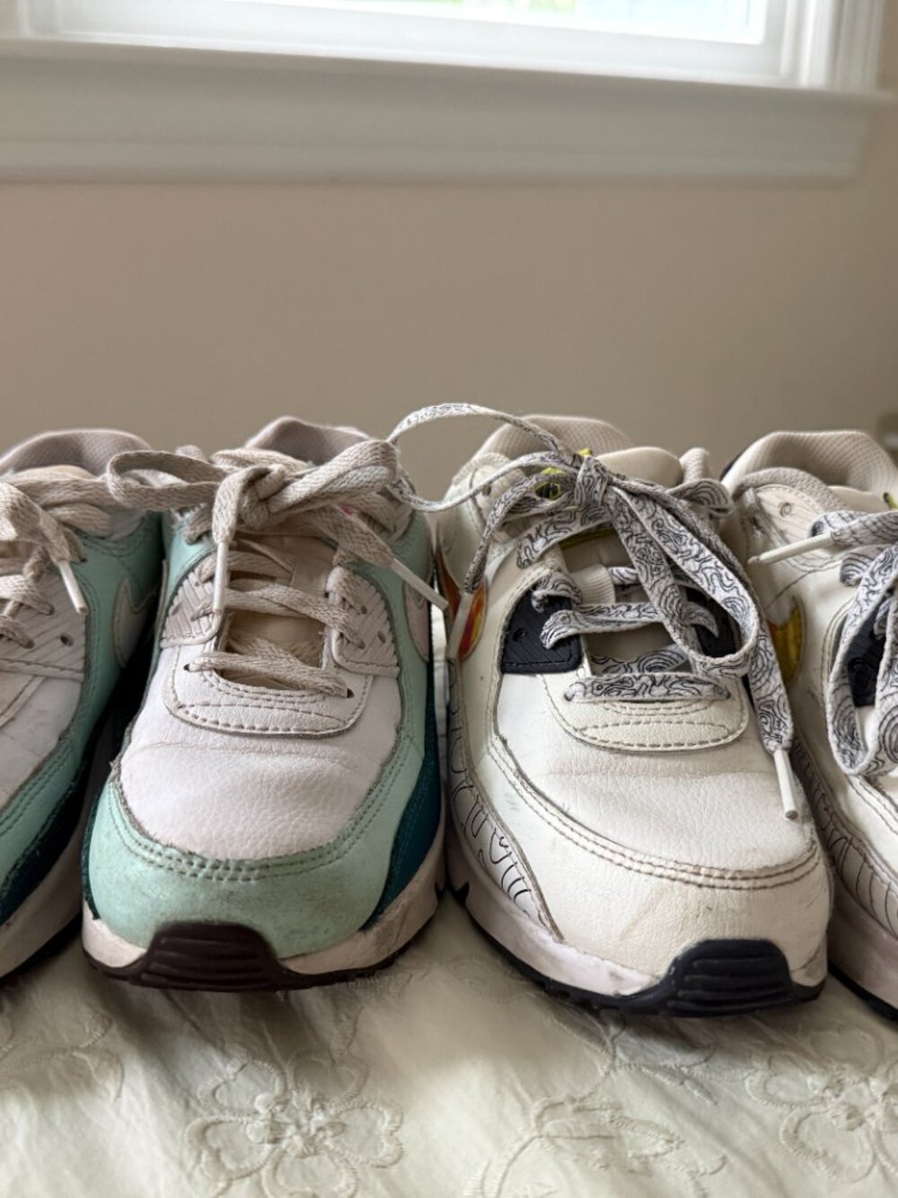 2 Pairs of Kids Nike Shoes